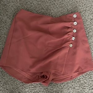 Dark pinkish-salmon skort. Size medium (or 4-6). Never worn.